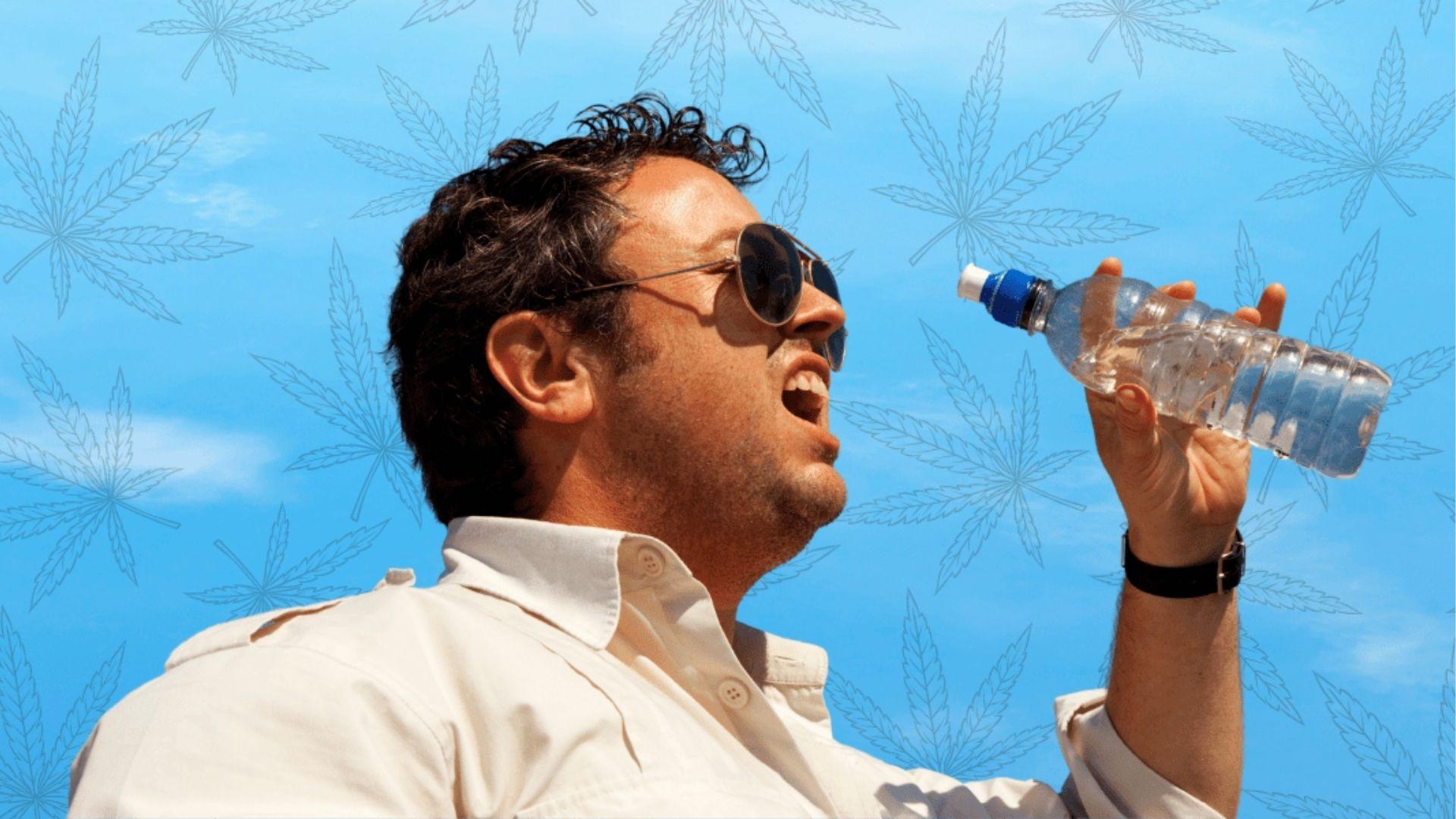 Man wearing sunglasses drinking bottled water against blue cannabis leaf background to relieve dry mouth from THC edibles