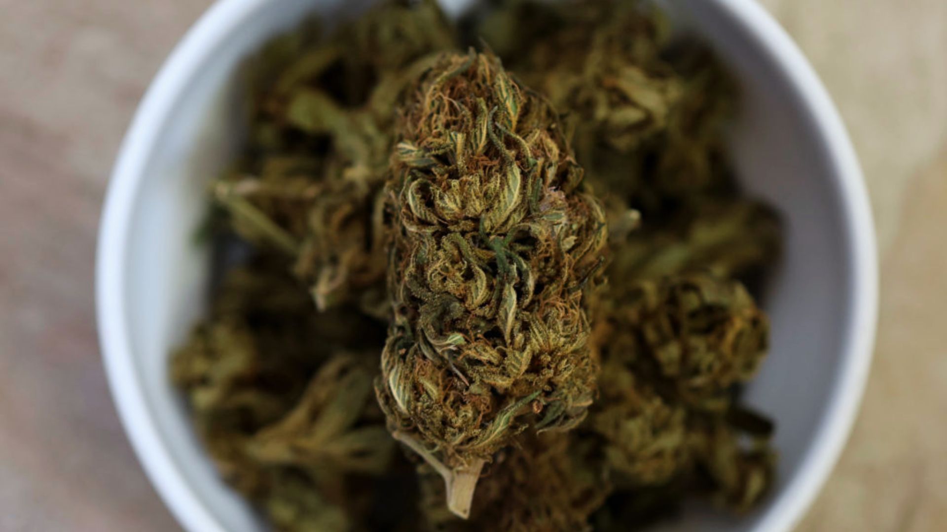 Cannabis buds with brown discoloration indicate oxidation and degradation as marijuana goes bad.