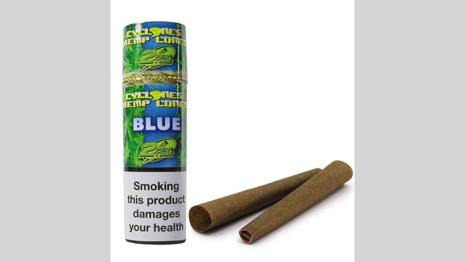 Cyclones Blue hemp cone packaging with health warning and two brown cones beside tube